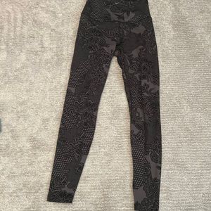 Black nike leggings with flowery pattern